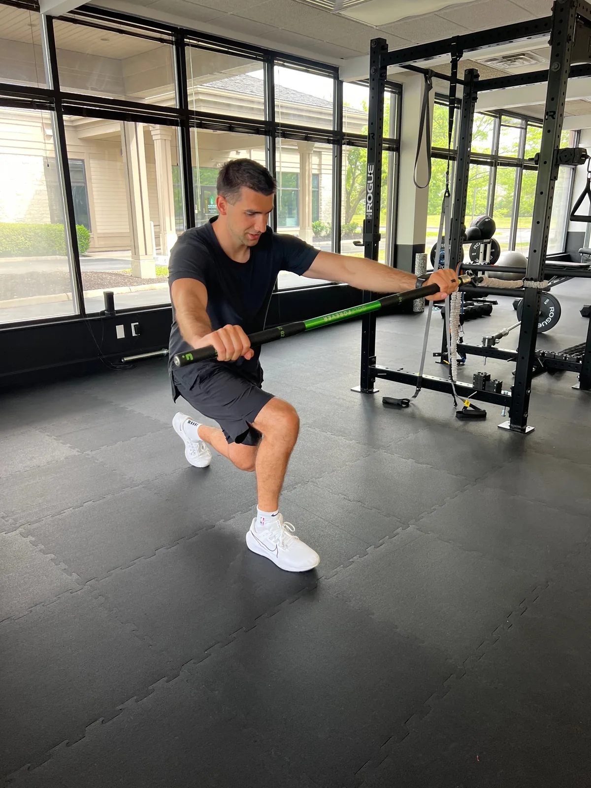 Dakota training through a GolfForever movement drill