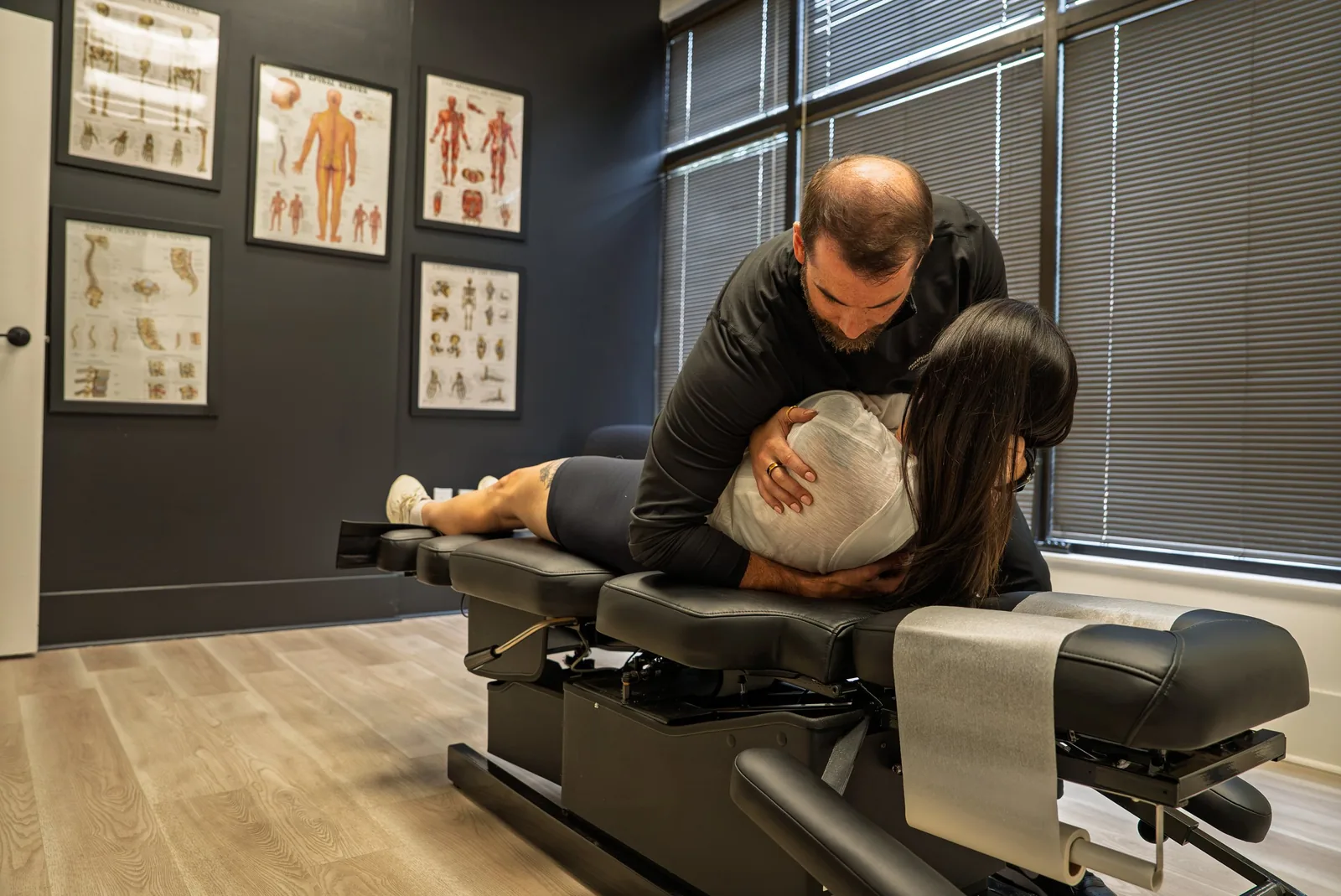 Dr. Mathias performing a thoracic spine adjustment