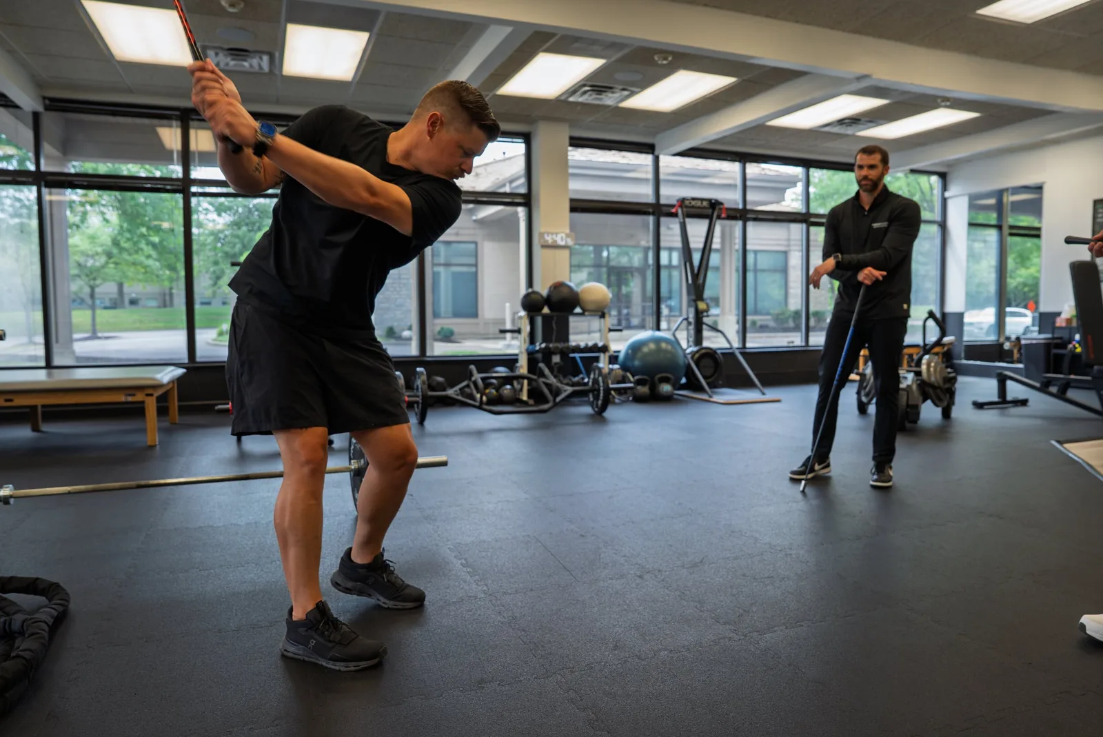 Golfer at the top of the backswing during a fitness session