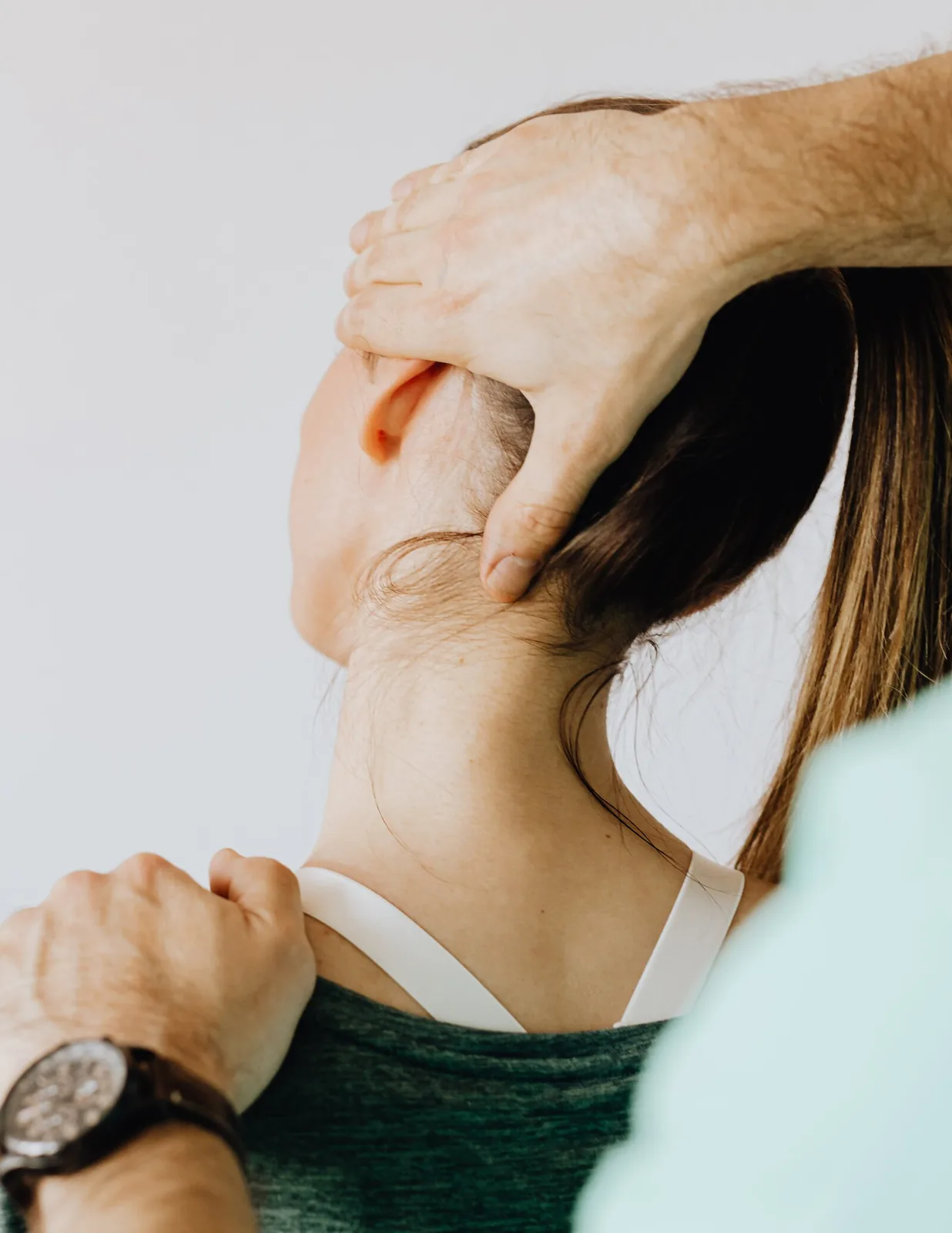 Hands-on muscle release work on the neck and shoulder